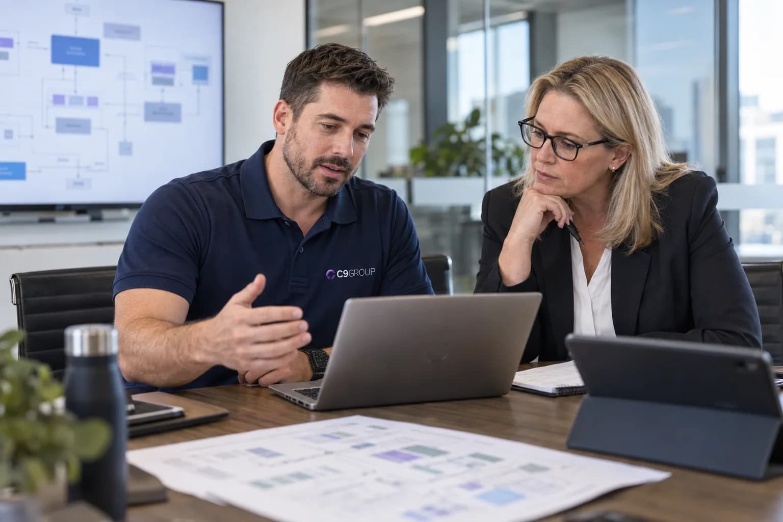 C9 GROUP consultant reviewing enterprise architecture priorities with an internal IT leader