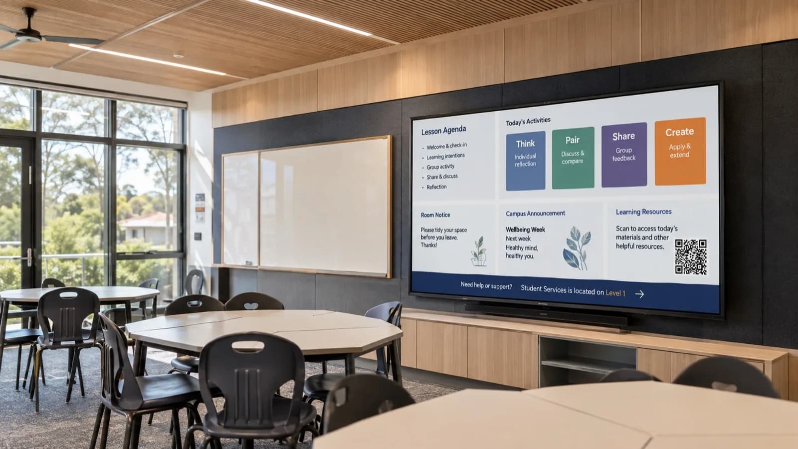 Interactive classroom display showing lesson agenda and campus notices