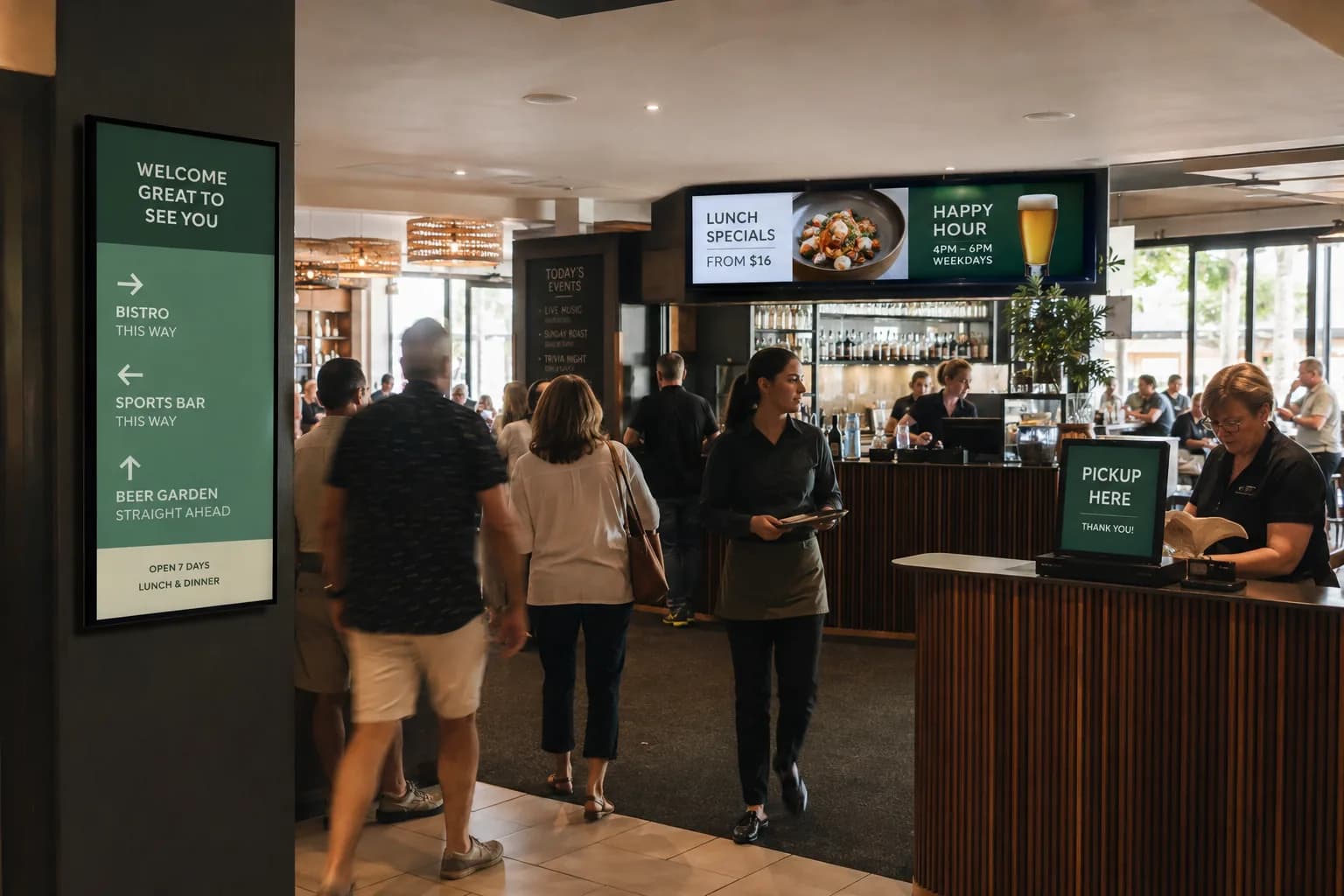Hospitality venue with slim digital signage for menus, promotions and guest messages