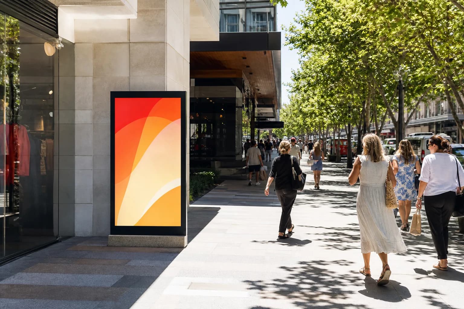 High brightness display facing an outdoor retail walkway in strong daylight