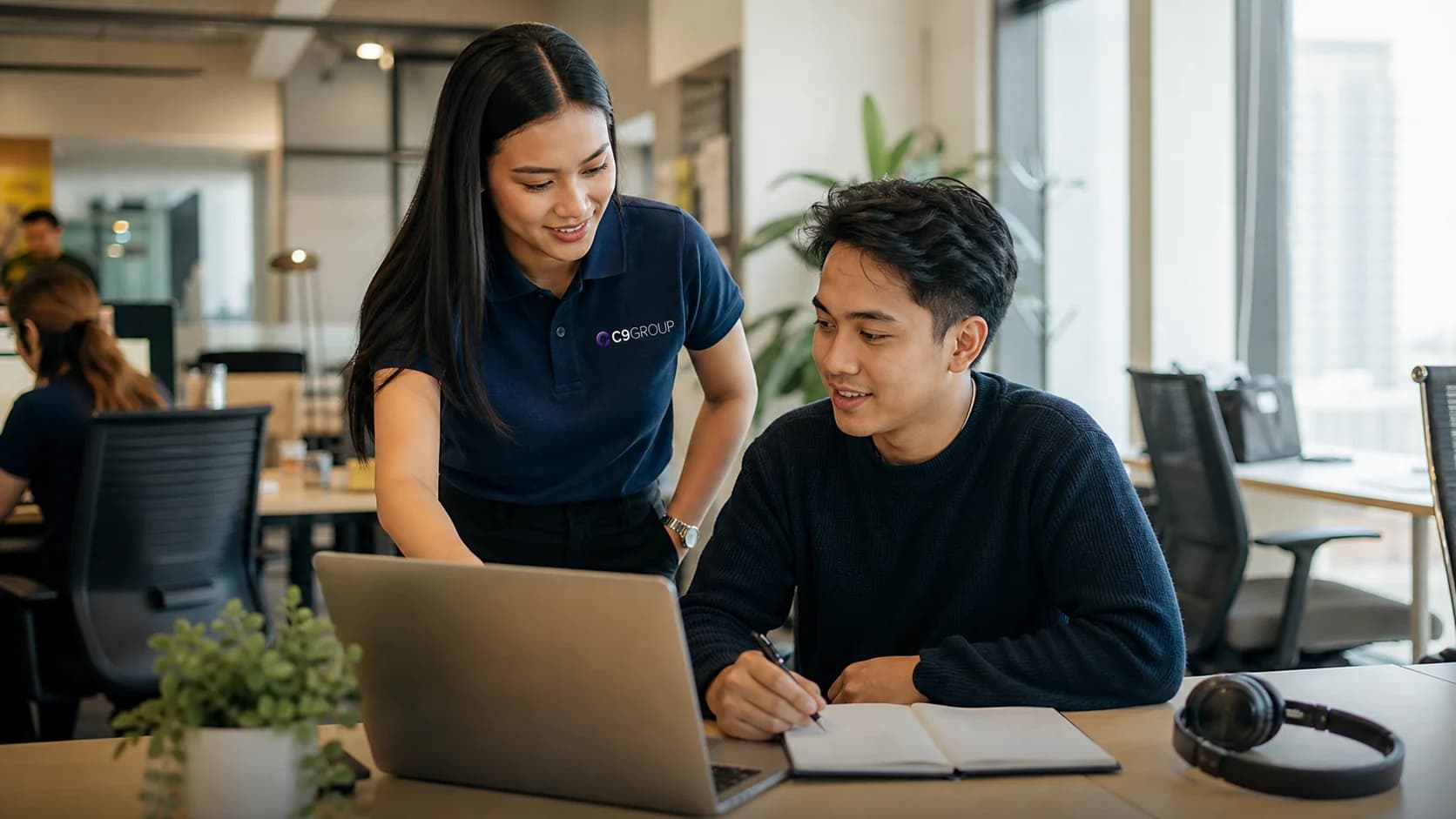 Filipino remote professional receiving support from a C9 GROUP workforce coordinator