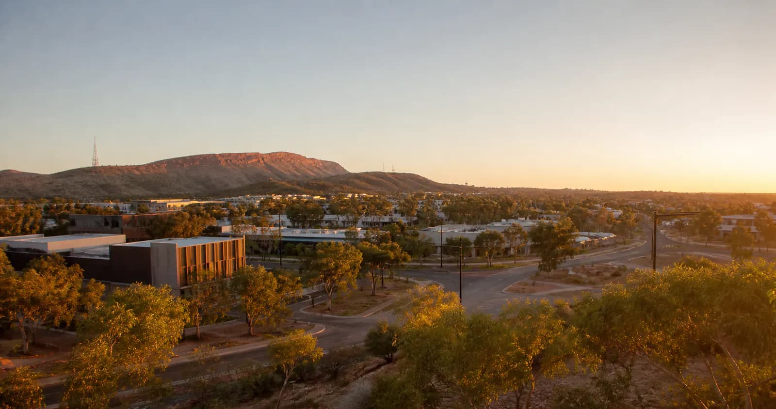 Australian regional business district with telecommunications infrastructure at dusk